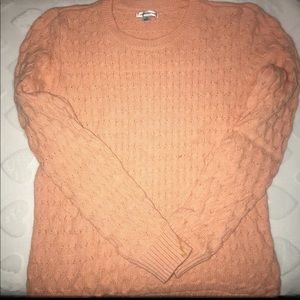 I am selling a crew neck sweater. Color is coral.